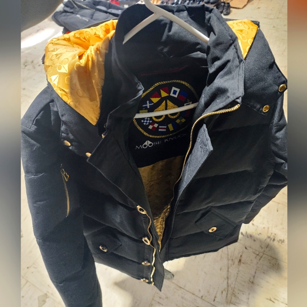 Moose Knookle Black Puffer Jacket with Gold Accents